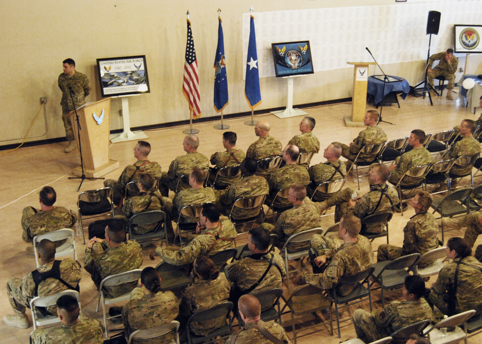 Dr. Richard Clark, 451st Air Expeditionary Wing historian, gives a brief presentation showcasing the 65-year history of the Air Force in a ceremony here Sept. 18. (U.S. Air Force photo/Master Sgt. Russell Martin/RELEASED)