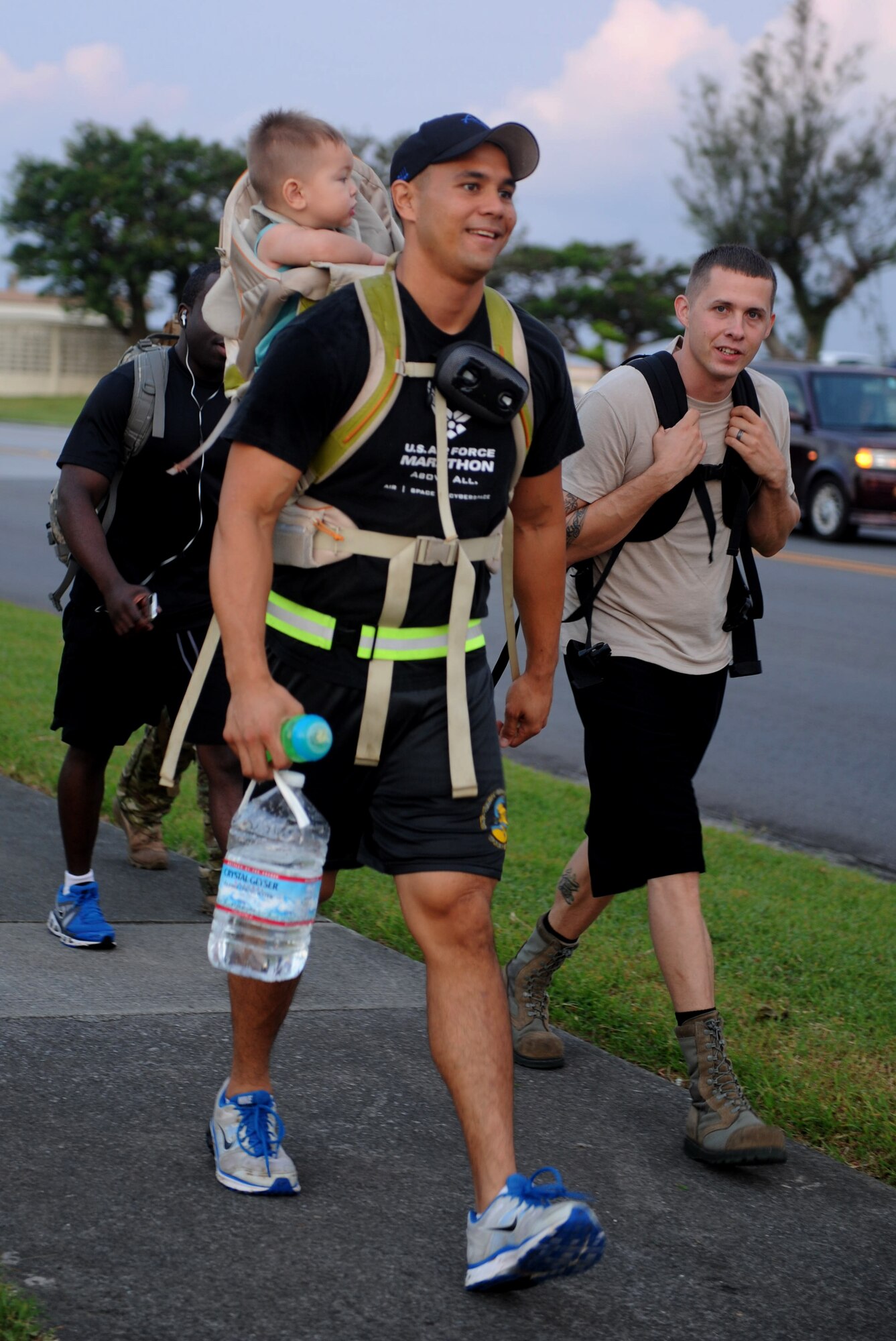 Team Kadena members participate in the 2012 Combined Federal Campaign kick-off 10K RuckMarch on Kadena Air Base, Sept. 19, 2012. The kick-off event raised more than $400 and will be donated toward Team Kadena’s goal of $451,000. (U.S. Air Force photo/Airman 1st Class Hailey R. Davis)