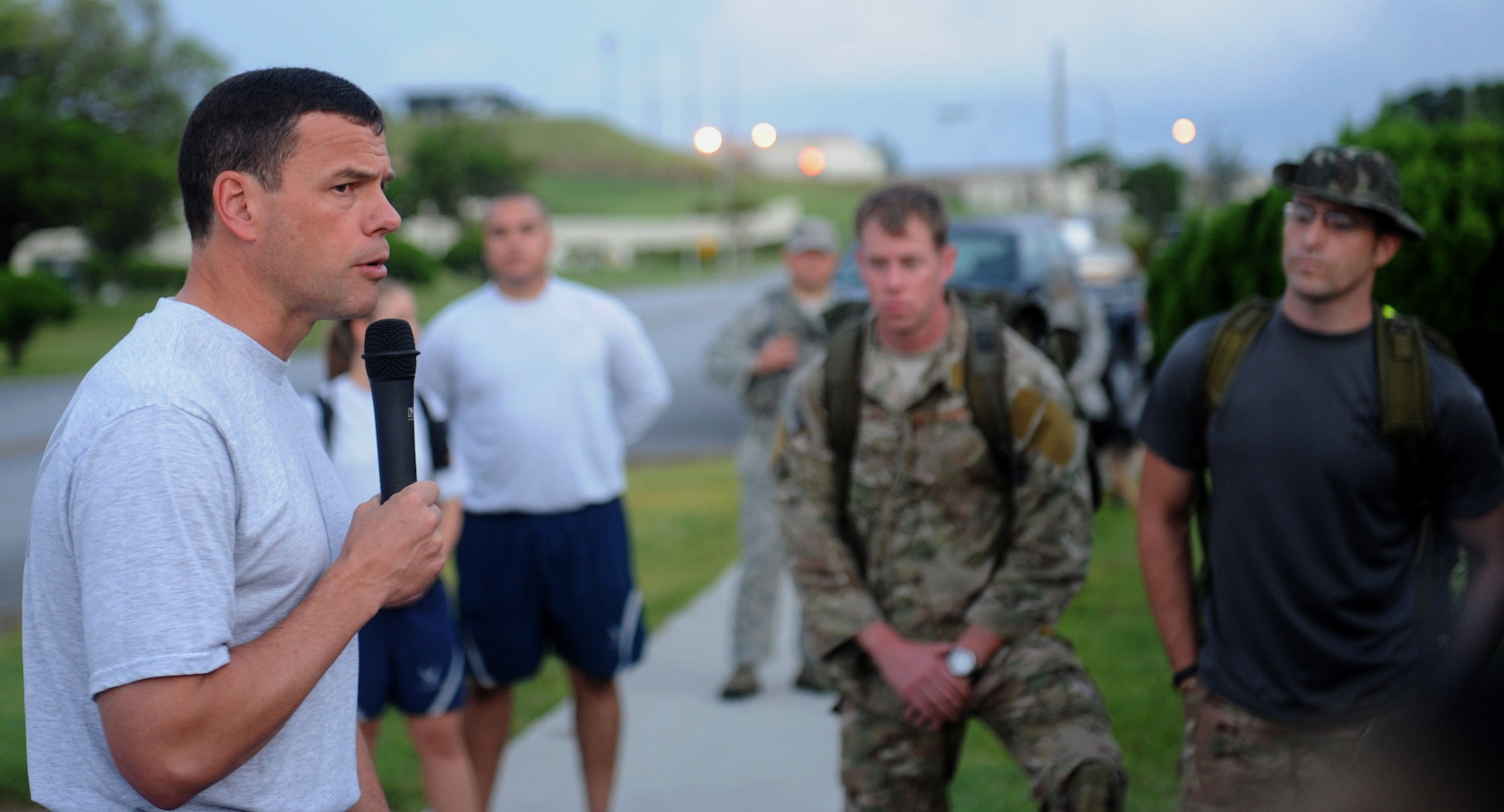 U.S. Air Force Brig. Gen. Matt Molloy, 18th Wing commander, motivates Team Kadena members participating in the 2012 Combined Federal Campaign kick-off 10K RuckMarch on Kadena Air Base, Sept. 19, 2012. Members of Kadena embarked on a 6.4 mile march and helped raise more than $400 that will be donated toward Team Kadena’s goal of $451,000. (U.S. Air Force photo/Airman 1st Class Hailey R. Davis)