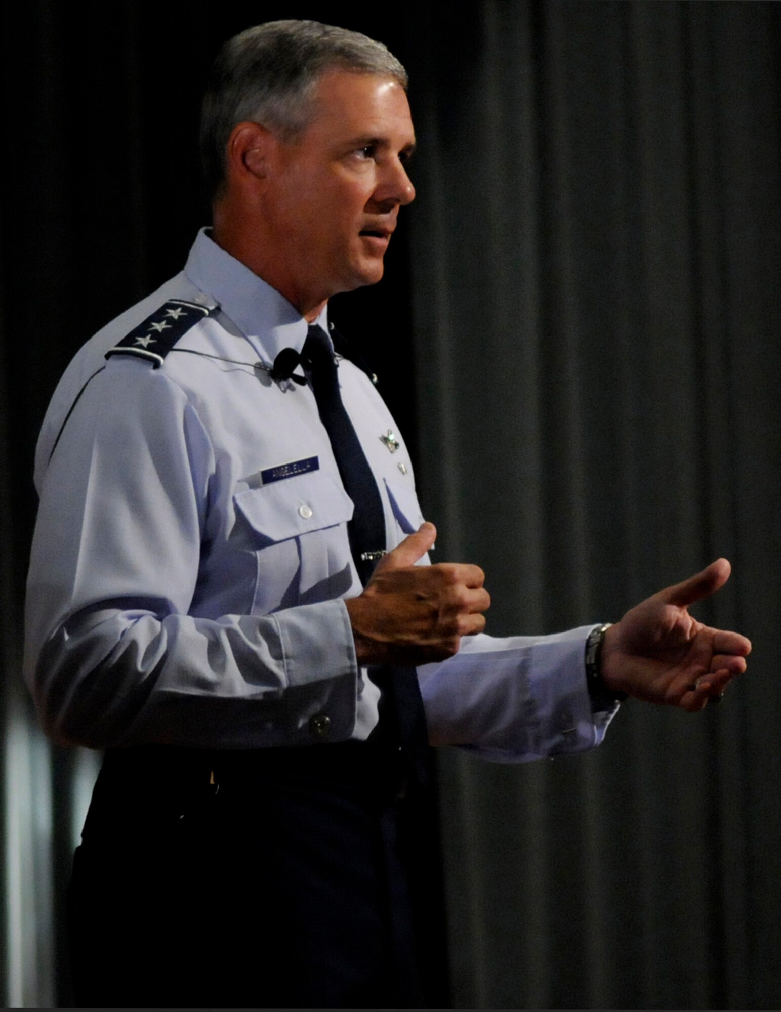 U.S. Air Force Lt. Gen. Sam Angelella, U.S. Forces Japan and 5th Air Force commander, speaks to Airmen during an all-call at the Keystone Theater on Kadena Air Base, Japan, Sept. 19, 2012. The general spoke about regional current events and answered questions and concerns of Kadena Airmen. (U.S. Air Force photo/Airman 1st Class Tara A. Williamson)
