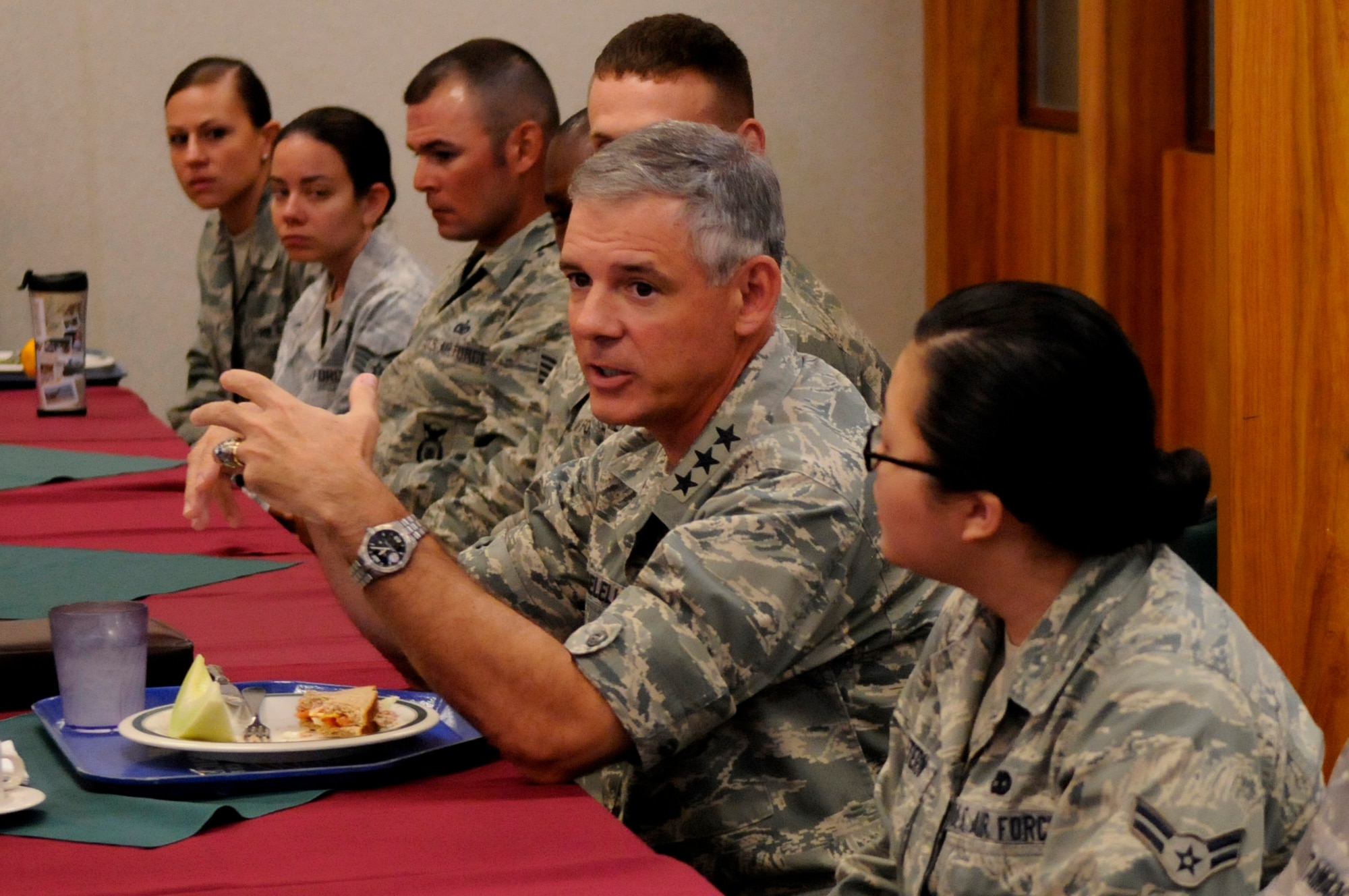 U.S. Air Force Lt. Gen. Sam Angelella, U.S. Forces Japan and 5th Air Force commander, answers questions from Airmen during a luncheon at the Marshall Dining Facility on Kadena Air Base, Japan, Sept. 19, 2012. The general also talked to the 30 Kadena Airmen in attendance about regional current events. (U.S. Air Force photo/Airman 1st Class Tara A. Williamson)