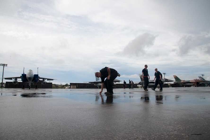 ANDERSEN AIR FORCE BASE, Guam - F-15's and other aircraft from Kadena Air
Base, Japan are parked on the flight line here, Sept. 17. The aircraft were
evacuated here from Kadena due to the typhoon threat in Okinawa, Japan and
inclement weather throughout the Asia-Pacific region. Historically, aircraft
from throughout the region have evacuated to Andersen in times of
threatening weather to ensure no damage occurs to the aircraft. (U.S. Air
Force photo by Senior Airman Carlin Leslie/Released)
