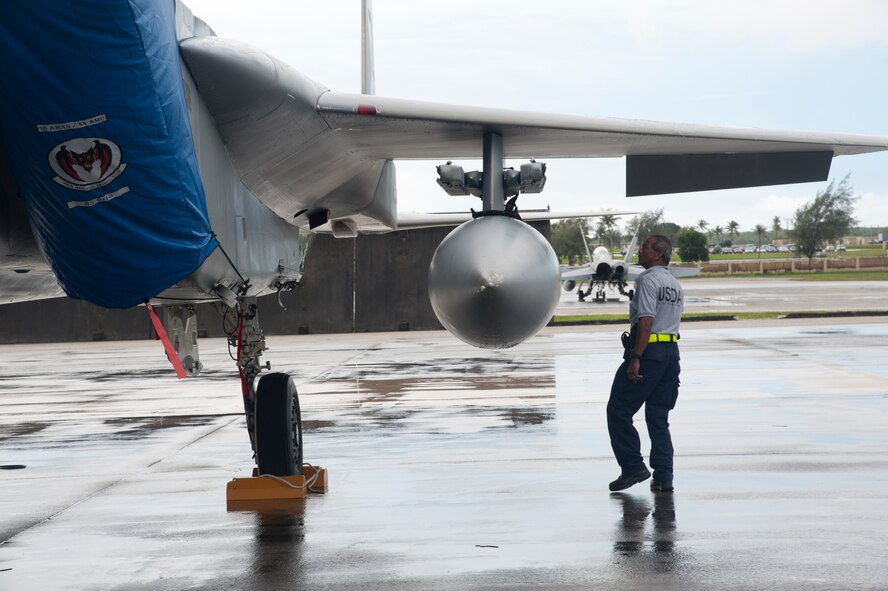 ANDERSEN AIR FORCE BASE, Guam - F-15's and other aircraft from Kadena Air
Base, Japan are parked on the flight line here, Sept. 17. The aircraft were
evacuated here from Kadena due to the typhoon threat in Okinawa, Japan and
inclement weather throughout the Asia-Pacific region. Historically, aircraft
from throughout the region have evacuated to Andersen in times of
threatening weather to ensure no damage occurs to the aircraft. (U.S. Air
Force photo by Senior Airman Carlin Leslie/Released)
