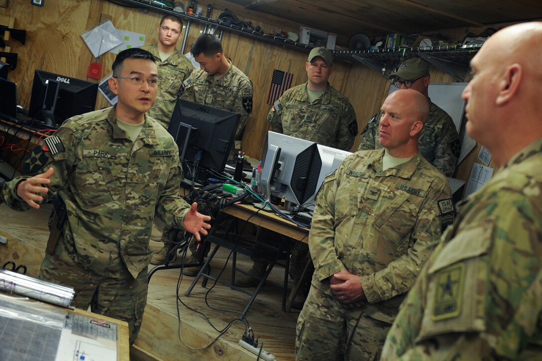 U.S. Army Maj. Kent Park, left, briefs U.S. Army Chief of Staff Gen. Ray Odierno on current operations during his visit to Forward Operation Base Zangabad in southern Afghanistan, Sept. 18, 2012. Park, an operations officer, is assigned to the 2nd Infantry Division's 1st Battalion, 23rd Infantry Regiment, 3rd Brigade.