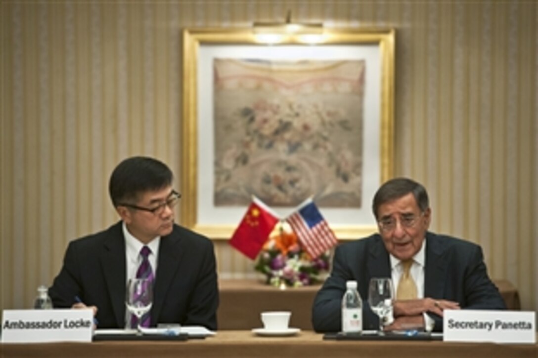 U.S. Defense Secretary Leon E. Panetta and U.S. Ambassador to China Gary Locke brief the press at a meeting in Beijing, Sept. 19, 2012. Panetta visited Tokyo before Beijing, and will travel to Auckland, New Zealand, during a weeklong trip to the Asia- Pacific region.