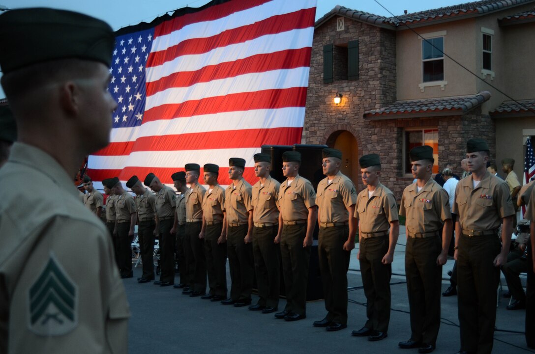 A troop formation from 1st Marine Division lined Rivera Drive in Temecula as Cpl. Juan Dominguez, who is a triple amputee due to injuries sustained during a deployment to Afghanistan, arrived at his new smart home, Sept. 11