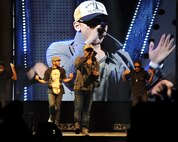 The singer Rain entertains United States and Republic of Korea Air Force members during a concert for Republic of Korea Air Force, United States Air Force and civilian personnel on Kunsan Air Base, RoK, Sept. 13, 2012. The concert also featured performances by Kaymon, Sunny Days and Stella. (U.S. Air Force photo/Staff Sgt. Jonathan Fowler)