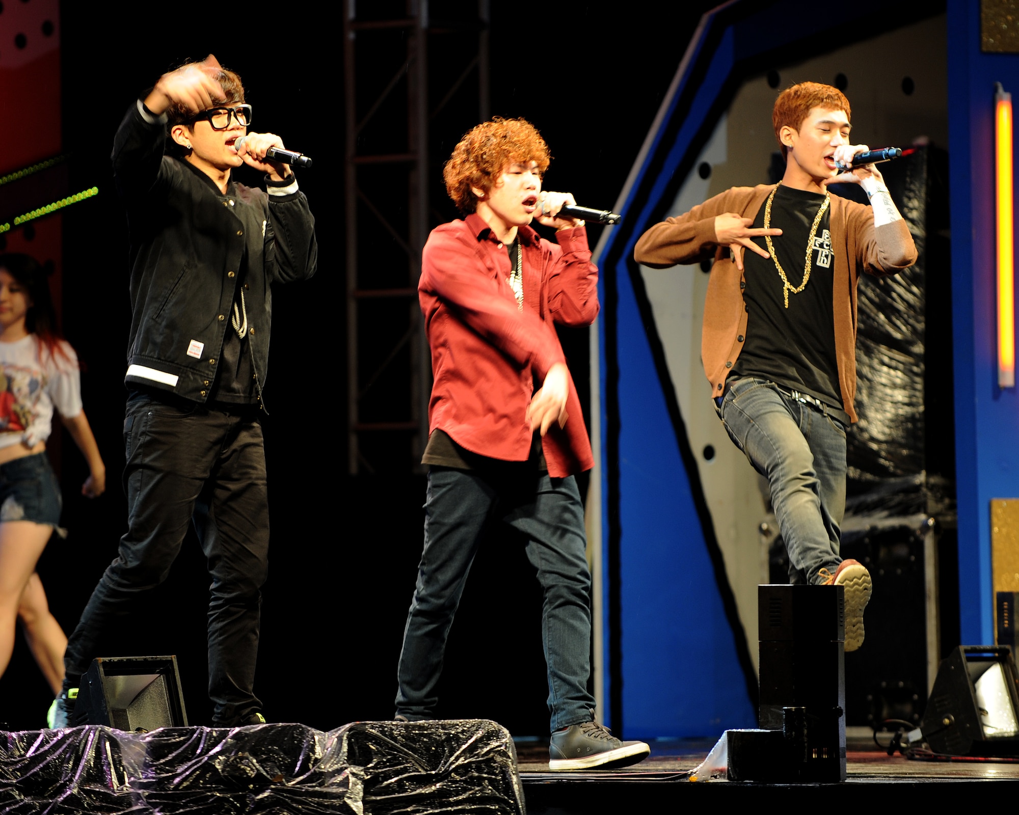 Members of the group Kaymon sing during a concert for Republic of Korea Air Force, United States Air Force and civilian personnel on Kunsan Air Base, RoK, Sept. 13, 2012. The concert featured performances by numerous Korean Pop and Dance groups such as Sunny Days and Rain. (U.S. Air Force photo/Staff Sgt. Jonathan Fowler)