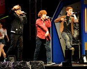 Members of the group Kaymon sing during a concert for Republic of Korea Air Force, United States Air Force and civilian personnel on Kunsan Air Base, RoK, Sept. 13, 2012. The concert featured performances by numerous Korean Pop and Dance groups such as Sunny Days and Rain. (U.S. Air Force photo/Staff Sgt. Jonathan Fowler)