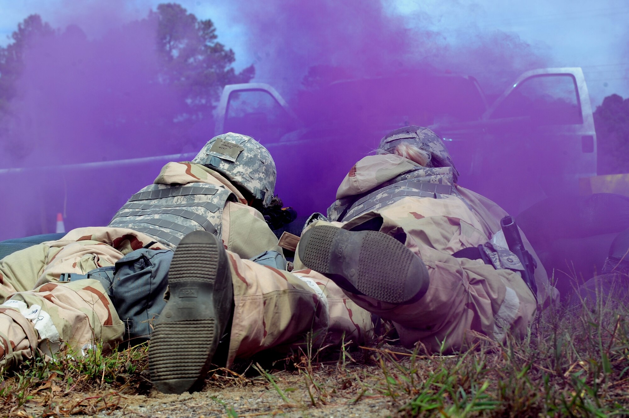 U.S. Air Force Airmen assigned to the 4th Security Forces Squadron point their weapons at a truck while under simulated attack at Base X during Phase II of Operational Readiness Exercise Coronet Warrior 12-04 on Seymour Johnson Air Force Base, N.C., Sept. 20, 2012. Simulated hostiles tested 4th SFS personnel's ability to react as they attempted to breach the entry control point. (U.S. Air Force photo/Airman 1st Class Aubrey Robinson/Released)
