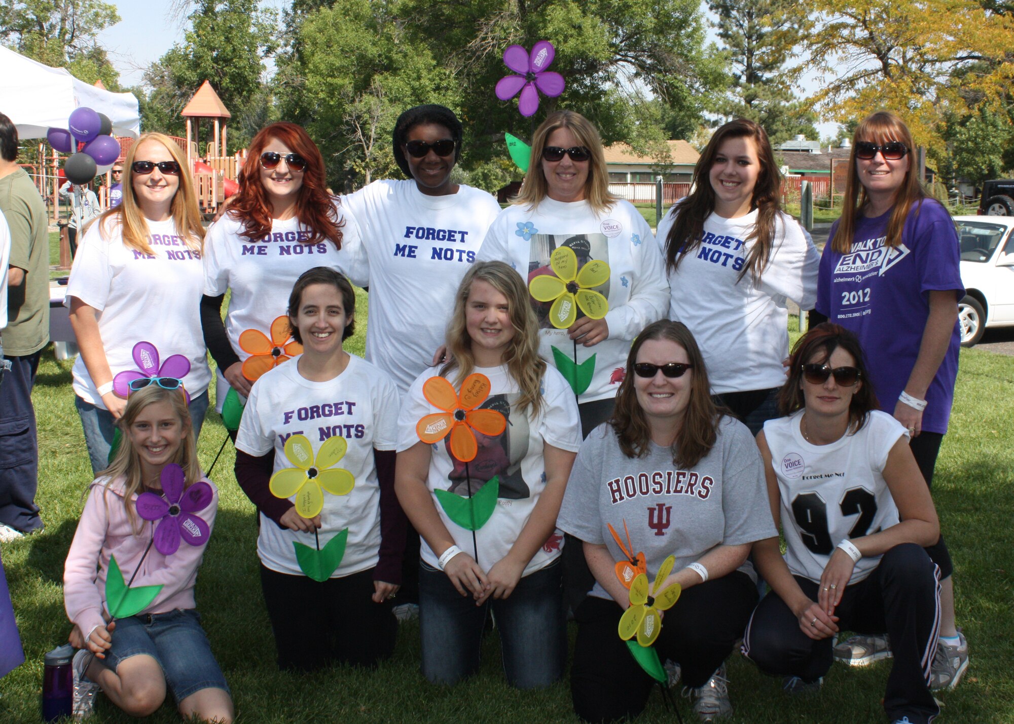 A group made up of all Team Malmstrom spouses pose for a photo before participating in the 3rd Annual Walk to End Alzheimer’s at Gibson Park on Sept. 16.  Named the “Forget Me Nots,” they raised just under $2,500 in support of awareness for Alzheimers, putting them in first place for the walk; one of their members, Tina Penny, rose just under $1,000, putting her in first place for individuals. Pictured from left to right are: (back row) Andrea Blum, Jennifer Hillier, Melanie Turner, Tina Penny, Lauren Johnson, Staci Sylva, (front row) Sophia Bilodeau, Rory Cullen, Kelsey Penny, Amy Morris and Kelli Kelley.  Not pictured: Amanda Wakefield.
