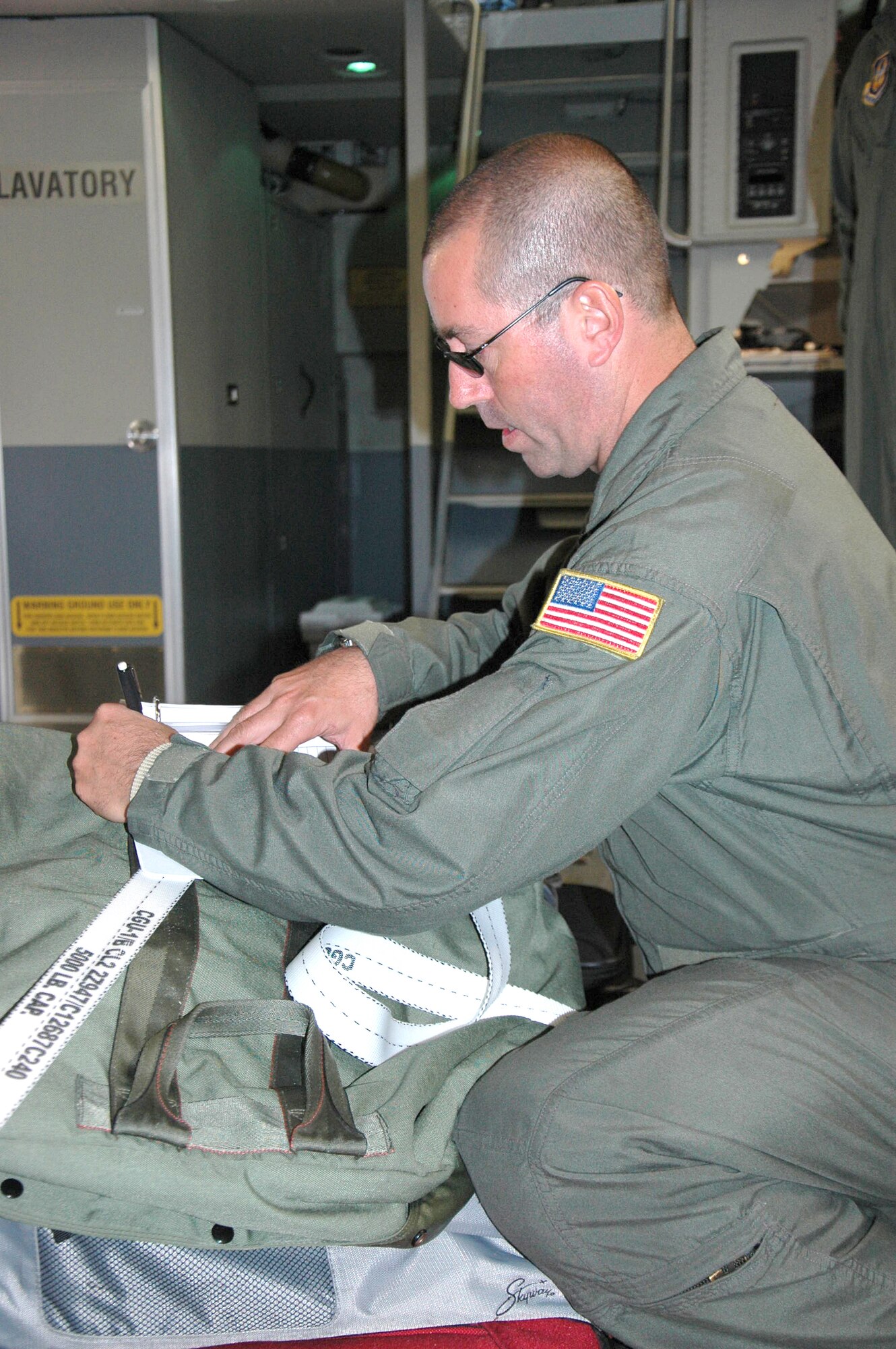 Tech. Sgt. Michael Chop, 446th Aircraft Maintenance Squadron, served as the first flying crew chief on aircraft P-218.  The newest C-17 to serve at McChord Field, Wash., was delivered Sept. 14 by Col. Bruce Bowers, 446th Airlift Wing commander.  The 446th AW is an Air Force Reserve wing here, sharing global airlift missions with the 62nd AW, the aircraft-owning unit. With three C-17 flying squadrons, the 2,300-strong wing provides aircrews and support on a daily basis to execute the Air Force's global airlift mission. (U.S. Air Force photo by Sandra Pishner)
