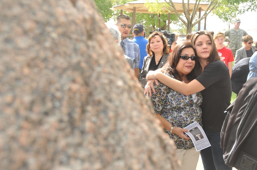KIRTLAND AFB, N.M. – Retired Lt. Gen. Leo Marquez’ daughter, Diana Marquez, and granddaughter, Adrienne Knighten, attend a ceremony here Sept. 17 renaming Bicentennial Park as “Marquez Park.” Marquez died Dec. 30 at age 79. (Photo by Todd Berenger)