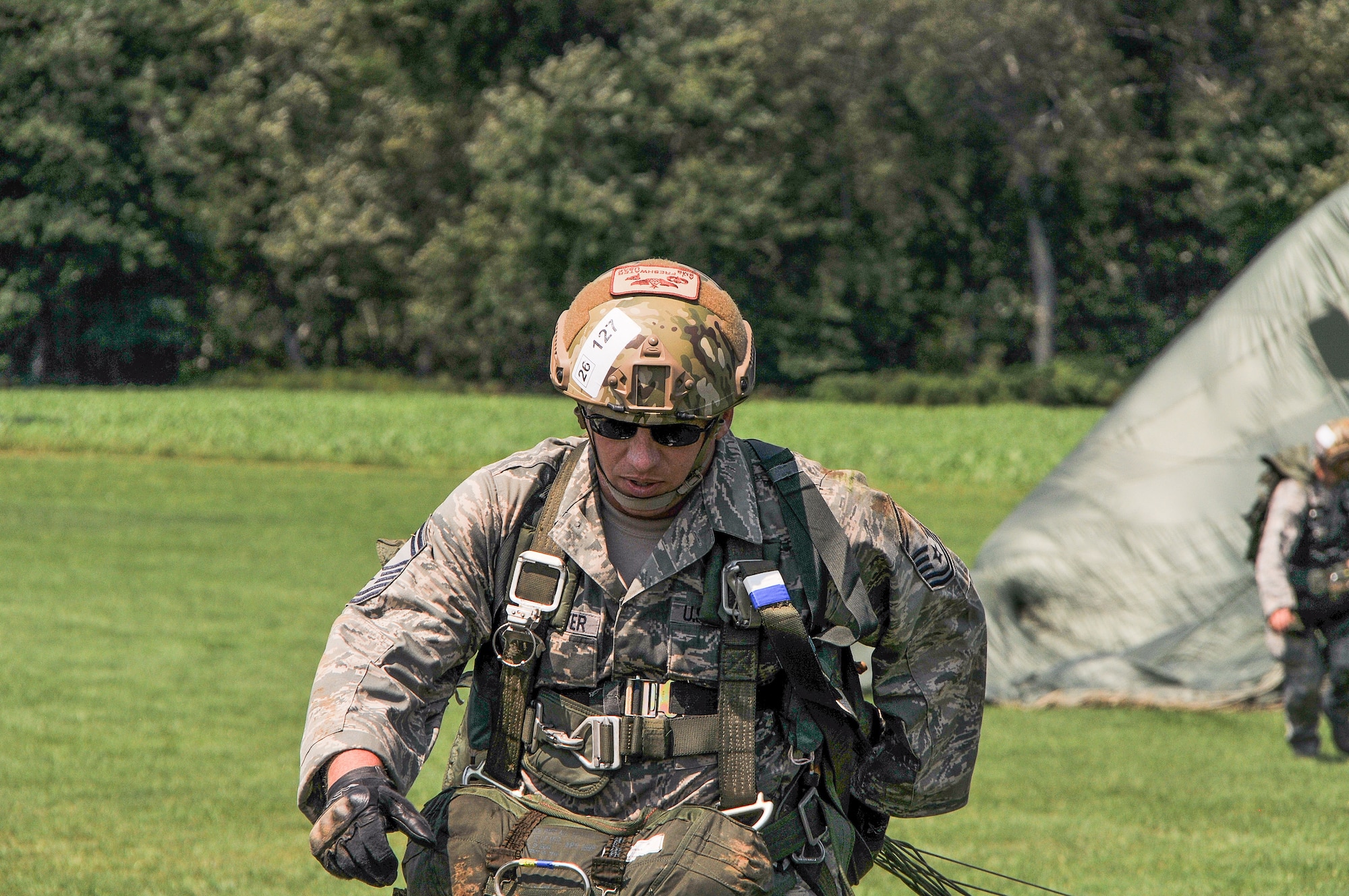 National Guard Senior Master Sgt. A.J. Freshwater runs towards the target during Leapfest 30, Aug. 4, 2012 in Kingston, R.I. Freshwater is one of two Air Support Operation Squadron teams to compete in the longest running static line parachuting competition in the world. (National Guard photo by Staff Sgt. Monica Eusebio/released)