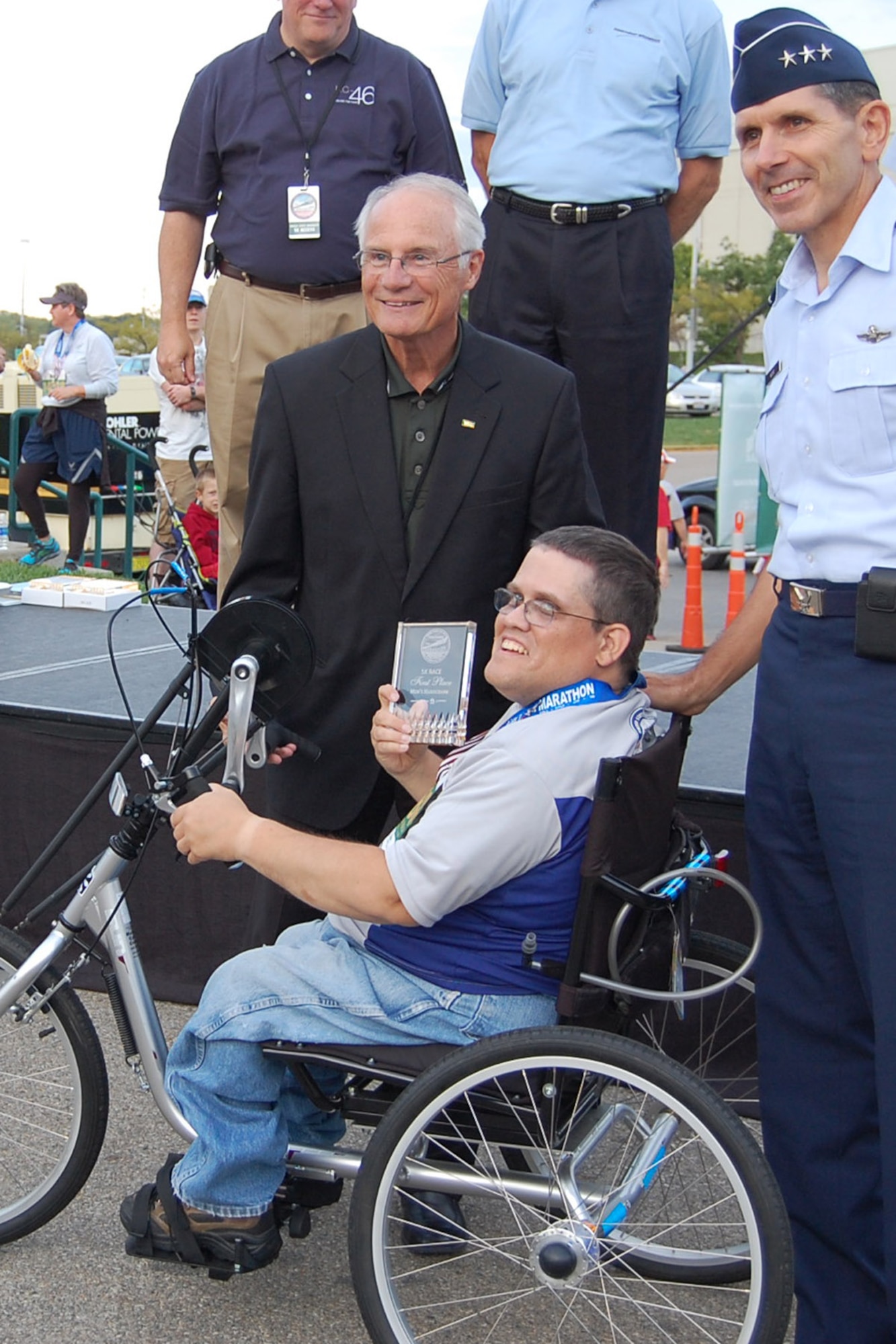 Rick A. Carr, 910th Airlift Wing base operator 1, receives his first place trophy at the USAF Marathon, Wright-Patterson Air Force Base, Ohio, Sept. 14. U.S. Air Force photo by Tech. Sgt. Rick Lisum.