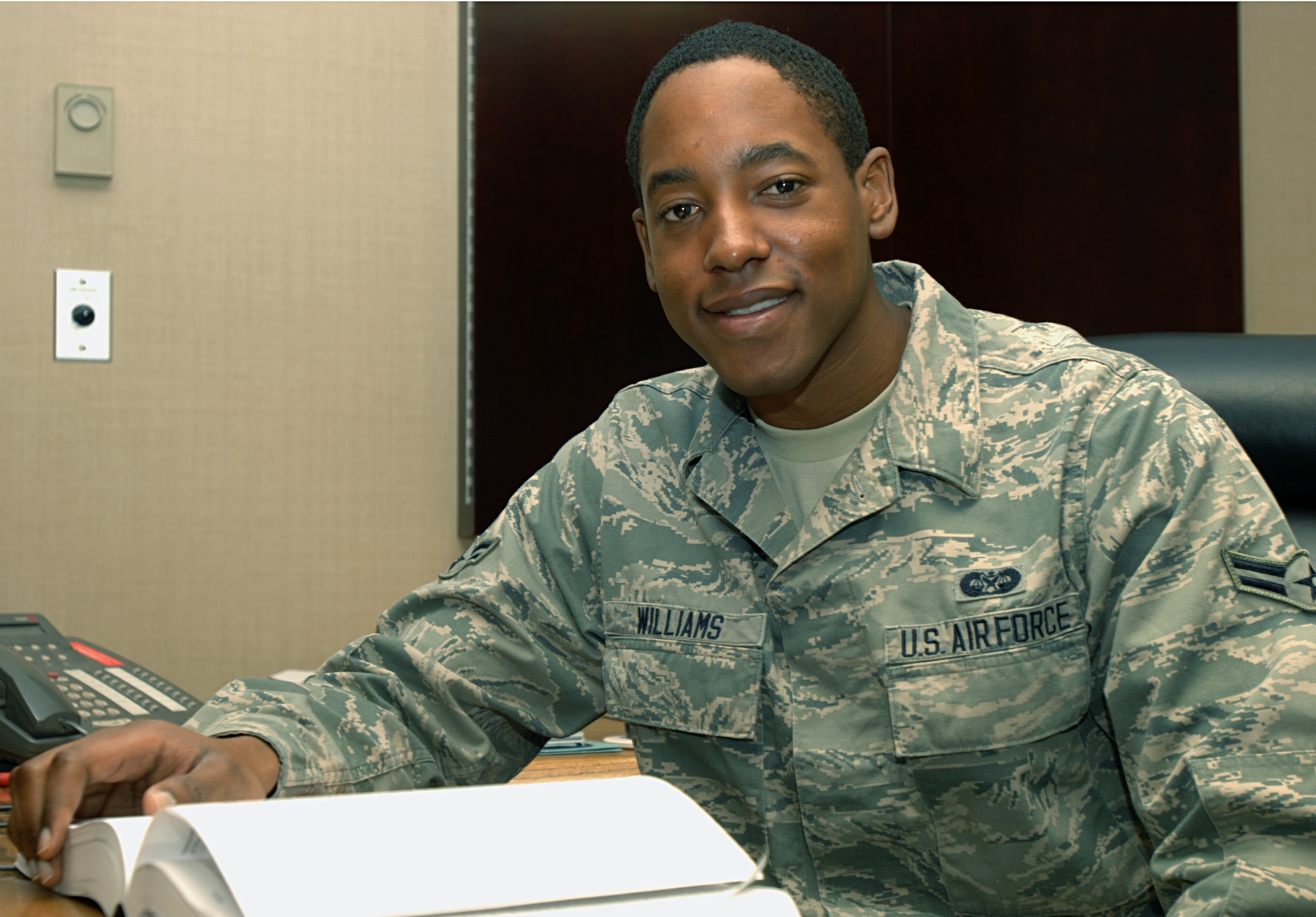 Airman 1st Class David Williams, 319th Air Base Wing Staff Judge Advocate paralegal, is this week's Warrior of the Week. Williams said he places great importance on helping others, and that he feels the Air Force puts him in the perfect position to reach out and lend a helping hand. He said one of his goals is to further his education by earning his bachelor's degree, and subsequently commissioning as an officer. (U.S. Air Force photo/Senior Airman Susan Davis)
