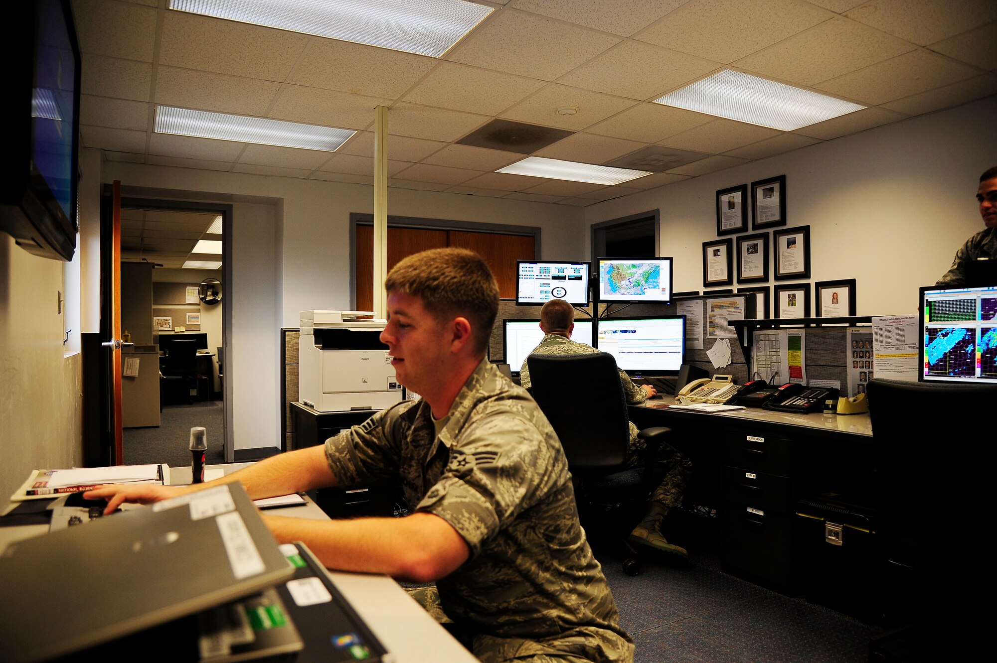 WHITEMAN AIR FORCE BASE, Mo. -- Senior Airman Franklyn Kapuchuck, 509th Operations Support Squadron weather forecaster, monitors weather radar and satellite Sept. 13, 2012. The Weather Flight uses radar and satellite information to brief pilots and key personnel to ensure aerial and ground missions are successfully executed. (U.S. Air Force photo/Heidi Hunt) (Released) 