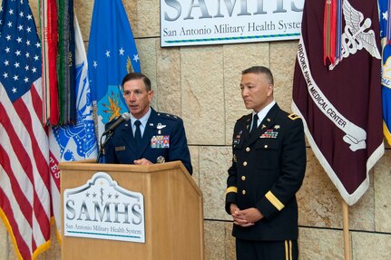 U.S. Air Force Maj. Gen. Byron Hepburn and Army Maj. Gen. Ted Wong speak during the San Antonio Military Health System one year anniversary celebration at the San Antonio Military Medical Center, Fort Sam Houston, Texas, Sept. 14. Hepburn is the SAMHS director and the 59th Medical Wing commander. Wong is the SAMHS deputy director and the Brooke Army Medical Center commander. (U.S. Air Force photo/Staff Sgt. Corey Hook) 
