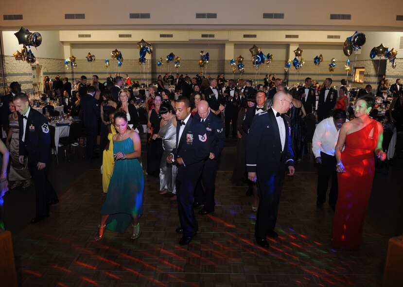 Airmen and guests fill the dance floor at the Air Force Ball in Valdosta, Ga., Sept. 14, 2012. Members of Moody, distinguished visitors, family and friends gathered to celebrate 65 years of Air Force heritage. (U.S. Air Force photo by Airman 1st Class Olivia Dominique/Released)