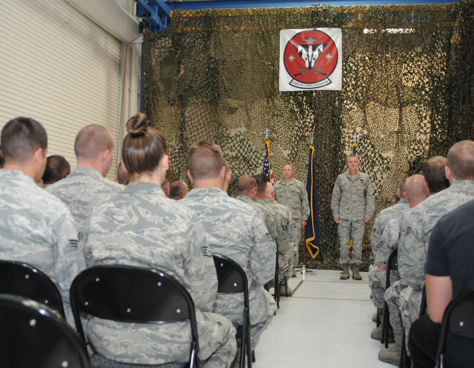Brig. Gen. Steven D. Gregg, commander of the Oregon Air National Guard, stands with Capt. Michael R. Balzotti, commander of the 270th Air Traffic Control Squadron, during a ceremony to present the squadron with the Air Force Outstanding Unit Award for 2011, Aug. 4, 2012. The ceremony marks the seventh consecutive year that the 270th has earned the award. (Oregon Air National Guard photo by Tech. Sgt. Jefferson Thompson, 173rd Fighter Wing Public Affairs/released