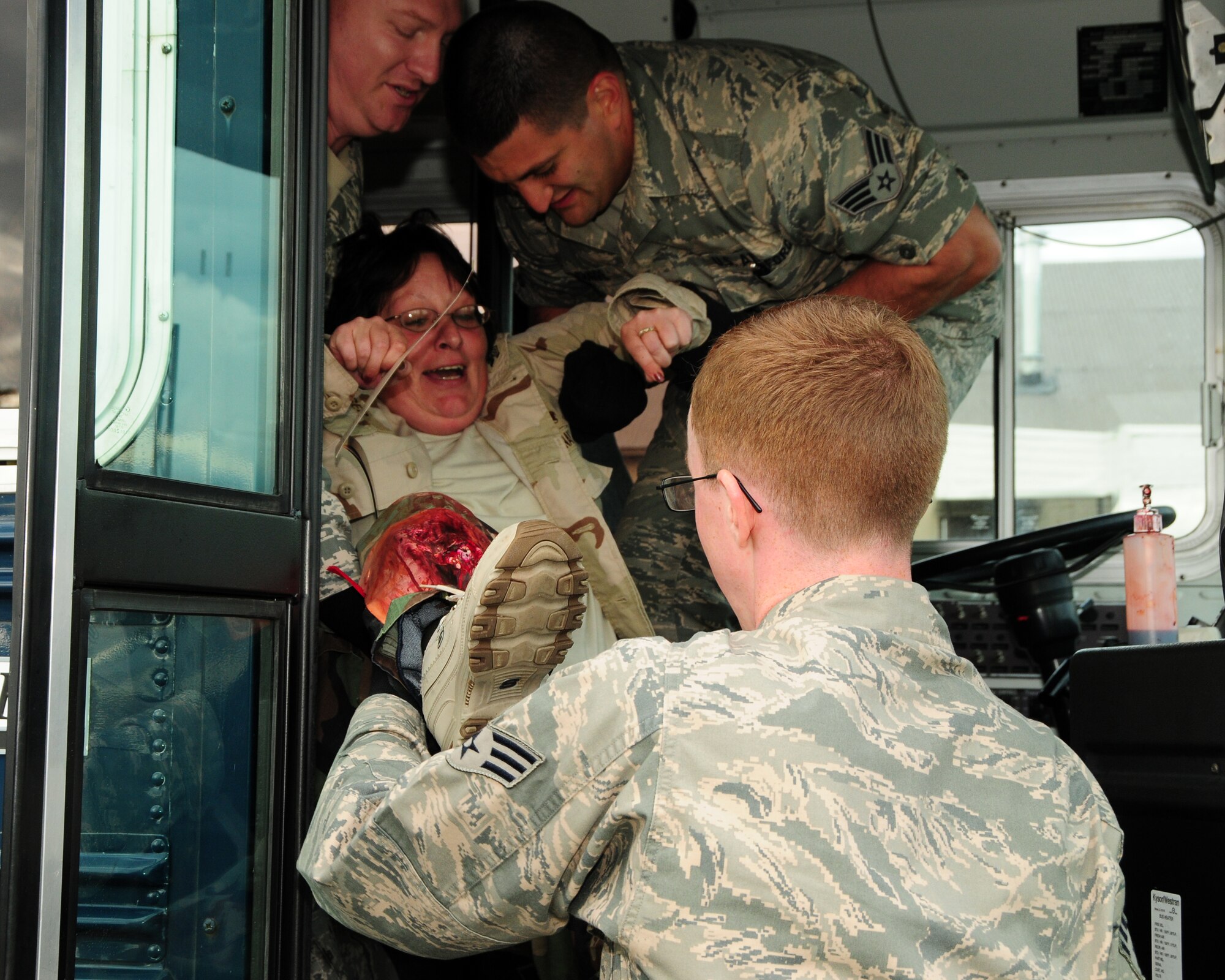 914th Aero Patient Staging Squadron members carry a patient who has suffered a simulated leg injury for transfer on a litter (stretcher) during a recent mass causality exercise which involved a multiple vehicle collision at the Niagara Falls Air Reserve Station, NY on September 9, 2012. The exercise was conducted to test the medical readiness and skills of the unit during an emergency. This exercise is an annual requirement for the ASTS. (US Air Force photo by Peter Borys)