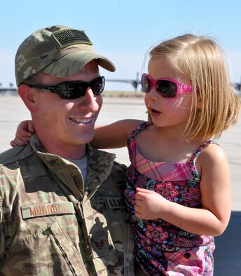 "I just knew you'd come back," said Emilee Murdock after reuniting with her father, Staff Sgt. Richard Murdock, a C-130 crew chief with the 52nd Airlift Squadron. Murdock and approimately 25 members of the 52nd AS returned Sept. 14, 2012, to Peterson Air Force Base, Colo. after a 120-day deployment to Bagram Airfield. He was a member of the Air Force Reserve associate squadron aircrews and aircraft maintainers that provided tactical airlift support to ground forces operating in Afghanistan. (U.S. Air Force photo/Tech. Sgt. Daniel Butterfield)