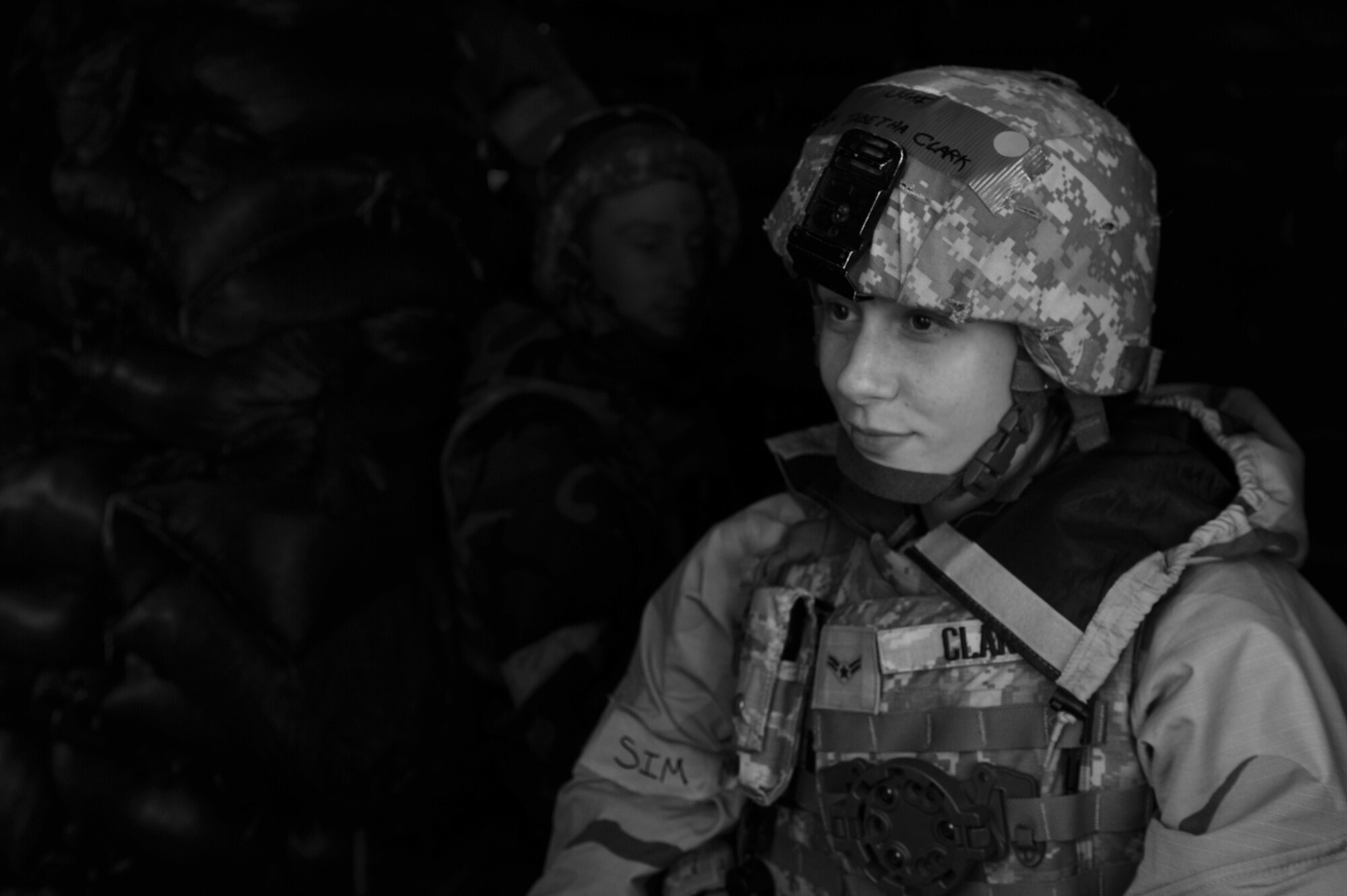 U.S Air Force Airman 1st Class Tabetha Clark, 4th Security Forces Squadron force protector, remains on the lookout for suspicious activity or persons while manning an entry control point during Operational Readiness Exercise Coronet Warrior 12-04 at Base X on Seymour Johnson Air Force Base, N.C., Sept. 19, 2012.  Airmen from the 4th SFS provide around-the-clock entry control point manning to protect Base X populace and assets while ensuring mission security and completion in simulated contested environments. (U.S. Air Force photo/2nd Lt. Keavy Rake)