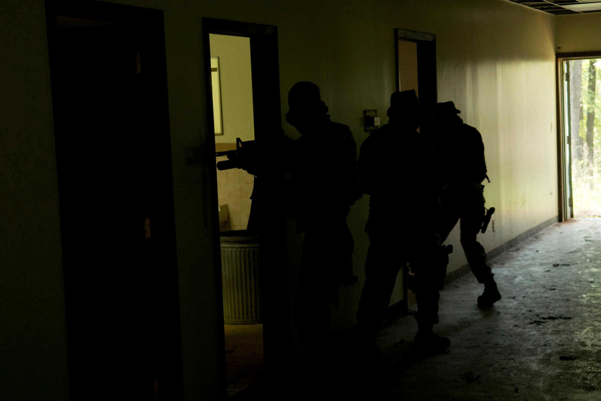Members of the 307th Security Forces Squadron practice clearing a building in preparation for the Global Strike Challenge, Sept. 7, 2012, Barksdale Air Force Base, La. Teams practiced scenarios which comprised of building searches and engaging enemy forces. (U.S. Air Force photo by Master Sgt. Greg Steele/Released)