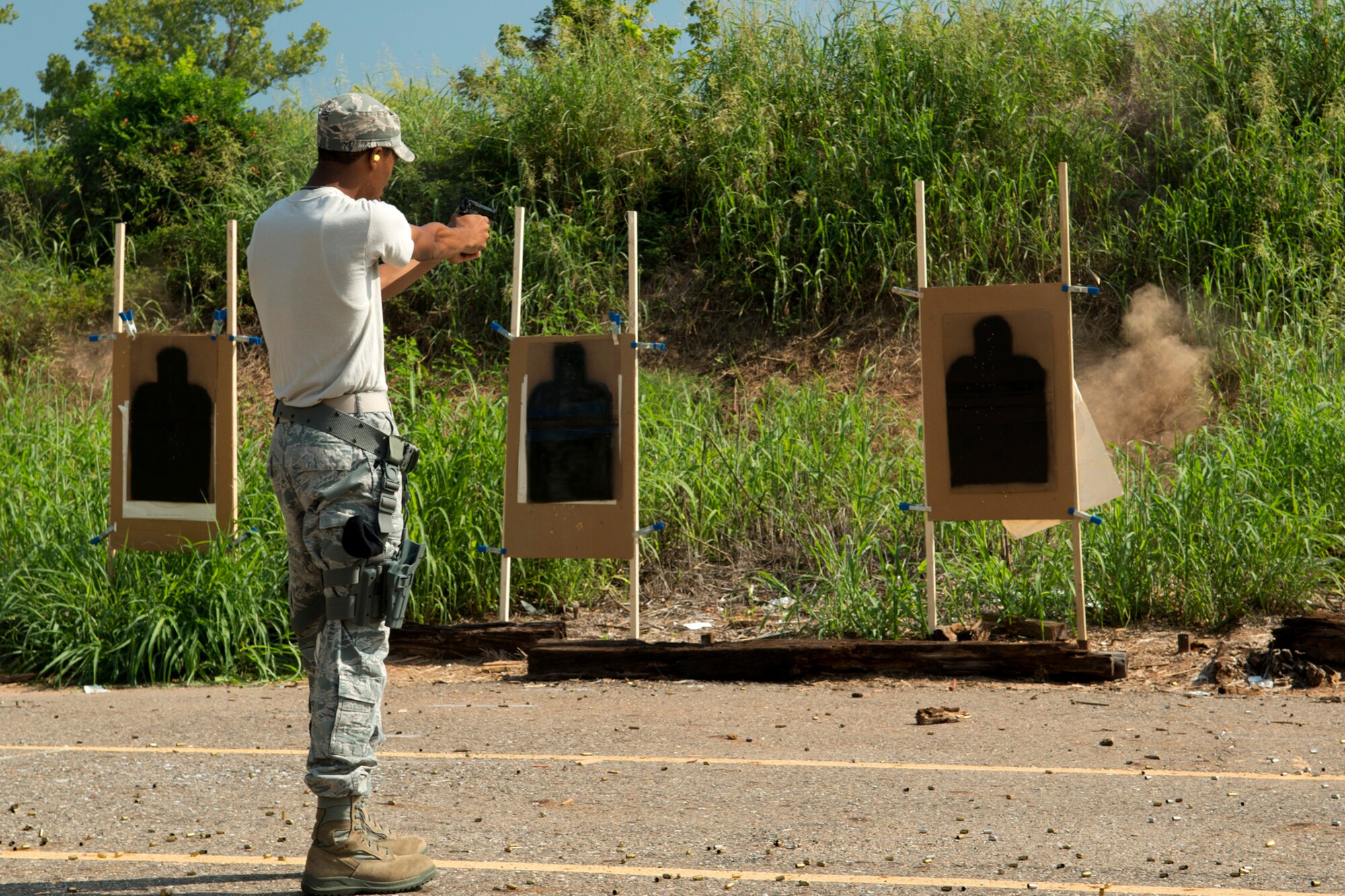 U.S. Air Force Senior Airman Stephen Boyd, 307th Security Forces Squadron, fires an Beretta M9 during practice for the Global Strike Challenge, Sept. 6, 2012, Barksdale Air Force Base, La. This will be Boyd's second time to compete in the challenge, which will be held at Camp Guernsey, Wyo. (U.S. Air Force photo by Master Sgt. Greg Steele/Released)