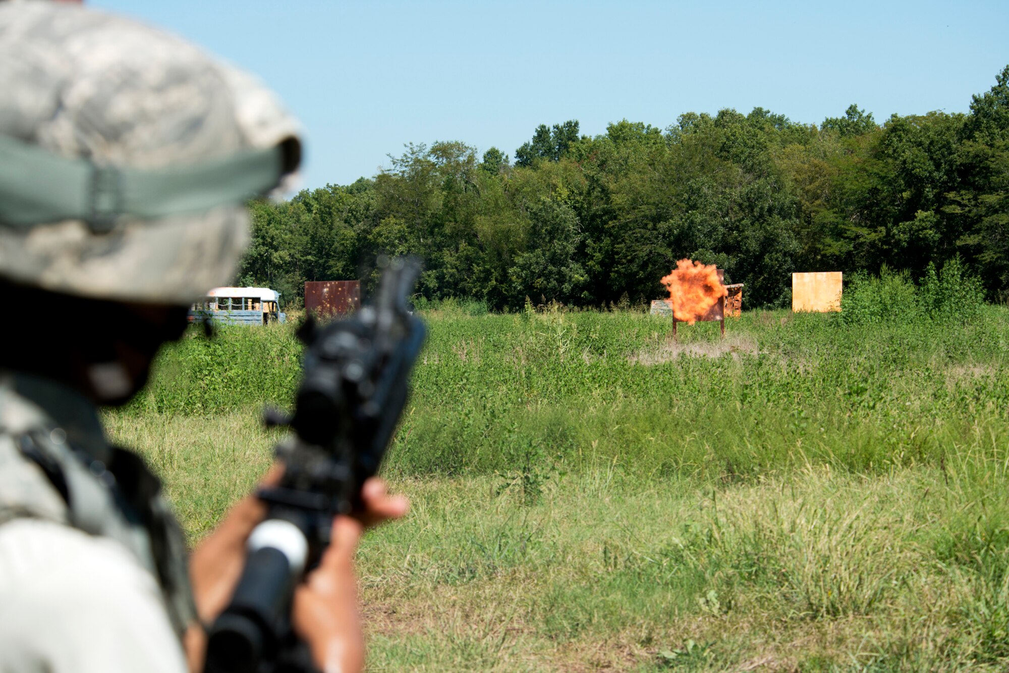 U.S. Air Force Senior Airman Stephen Boyd, 307th Security Forces Squadron, watches the impact of a 40mm practice grenade during training for the Global Strike Challenge, Sept. 5, 2012, Barksdale Air Force Base, La. The GSC is the world's premiere bomber, intercontinental ballistic missile and security forces competition with units participating from Air Force Global Strike Command, Air Combat Command, Air Force Material Command, Air Force Reserve Command and the Air National Guard. (U.S. Air Force photo by Master Sgt. Greg Steele/Released)