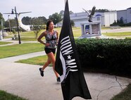 Senior Master Sgt. Bridget Bruhn, 461st Air Control Network Squadron, runs during her time slot of a 24-hour run that began at 3 p.m. Wednesday prior to Robins POW/MIA recognition ceremony on Thursday.
The Robins POW/MIA Committee will host a recognition ceremony Thursday at 3 p.m. in the Museum of Aviations Century of Flight Hangar.
J.D. Lankford, author of "Walk With Me" and former World War II POW and Korean War veteran, will be the guest speaker. (U. S. Air Force photo/Sue Sapp)