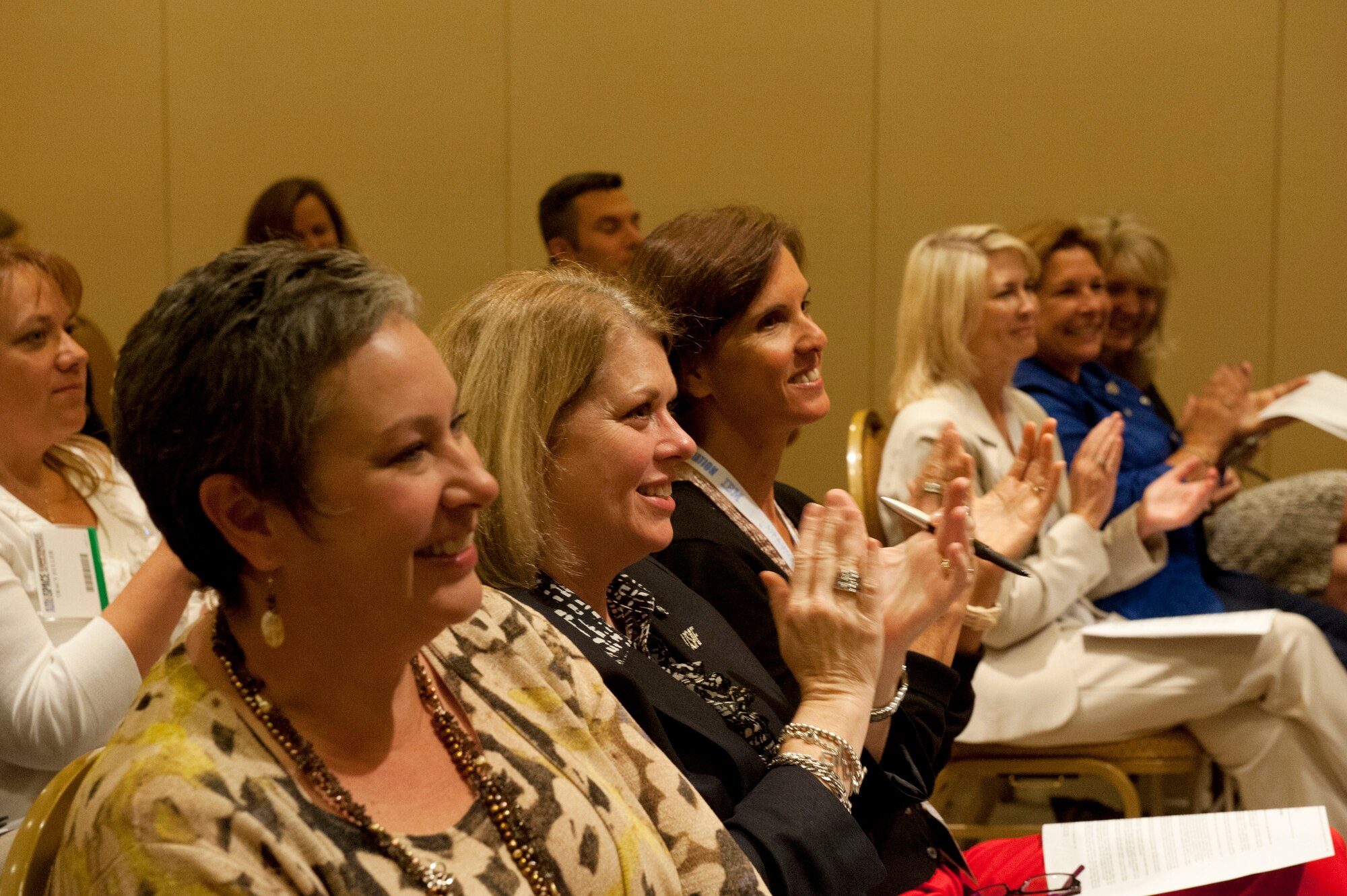 Attendees applause as they listen to one of the speakers during the Air Force Association Family Forum in Washington, D.C., Sept. 17, 2012. (U.S. Air Force photo/Val Gempis)