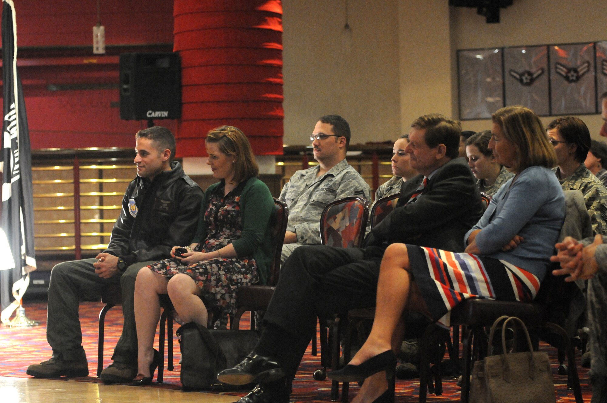 Attendees listen during a prisoner-of-war/missing-in-action interactive presentation at RAF Mildenhall, England, Sept. 19, 2012. Speaking during the event were Dr. Howard Tuck, a historian, and retired RAF Air Cdre Charles Clarke and Andy Wiseman, both former prisoners of war during World War II, who were held captive in the German prison camp Stalag Luft III. They visited Mildenhall to share their stories during POW/MIA remembrance week. (U.S. Air Force photo/Tech. Sgt. Neal X. Joiner)