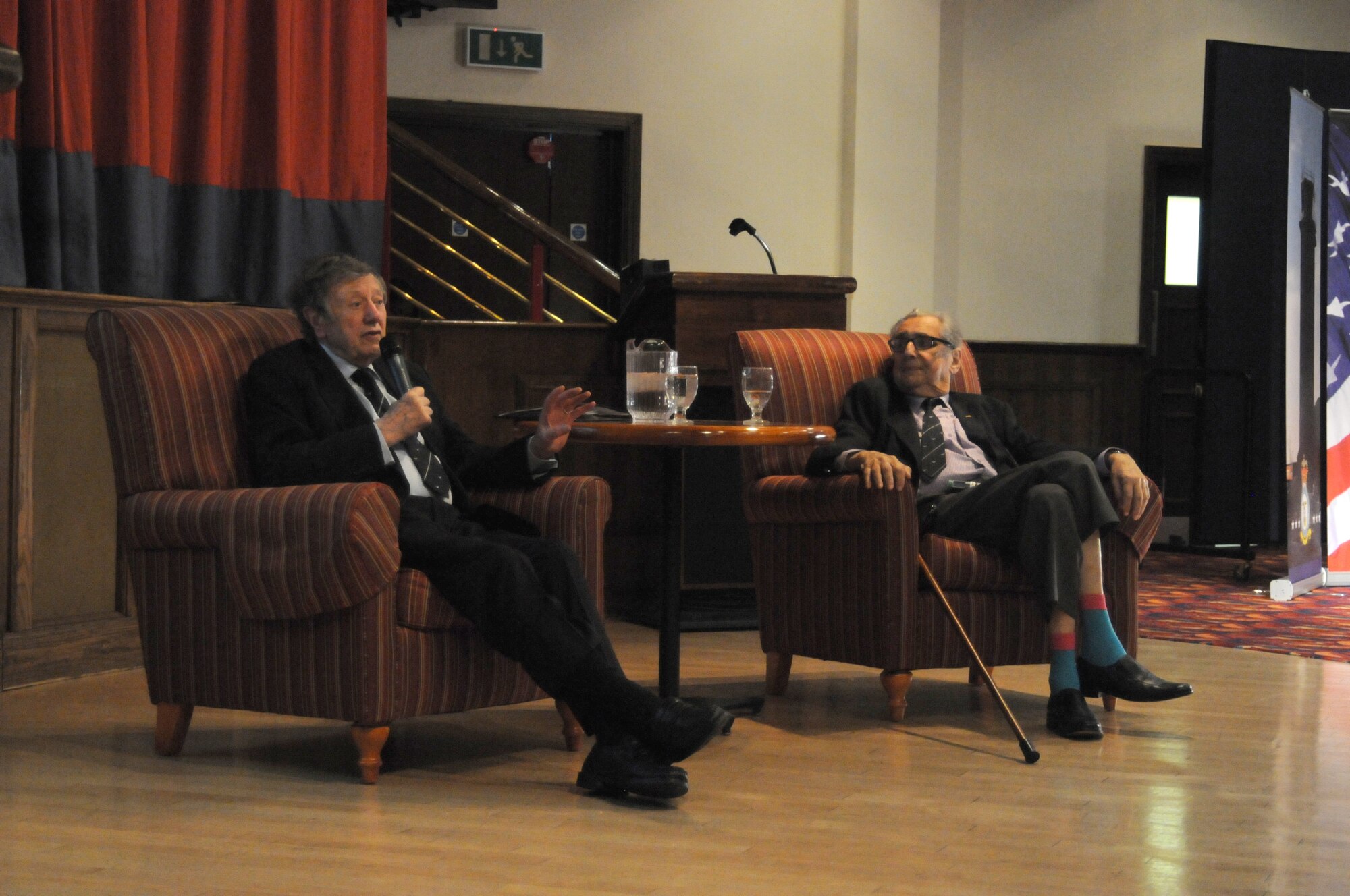 RAF Mildenhall, England - Retired RAF Air Cdre Charles Clarke, left, a former prisoner of war during World War II, speaks during a prisoner-of-war/missing-in-action interactive presentation at RAF Mildenhall, England, Sept. 19, 2012. Clarke and Andy Wiseman, both former prisoners of the German prison camp Stalag Luft III, visited Mildenhall to share their stories during POW/MIA remembrance week. (U.S. Air Force photo/Tech. Sgt. Neal X. Joiner)