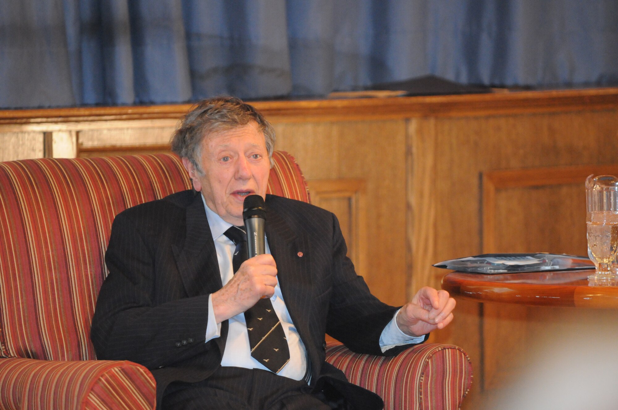RAF Mildenhall, England - Retired RAF Air Cdre Charles Clarke, a former prisoner of war during World War II, speaks during a prisoner-of-war/missing-in-action interactive presentation at RAF Mildenhall, England, Sept. 19, 2012. Clarke and Andy Wiseman, both former prisoners of the German prison camp Stalag Luft III, visited Mildenhall to share their stories during POW/MIA remembrance week. (U.S. Air Force photo/Tech. Sgt. Neal X. Joiner)