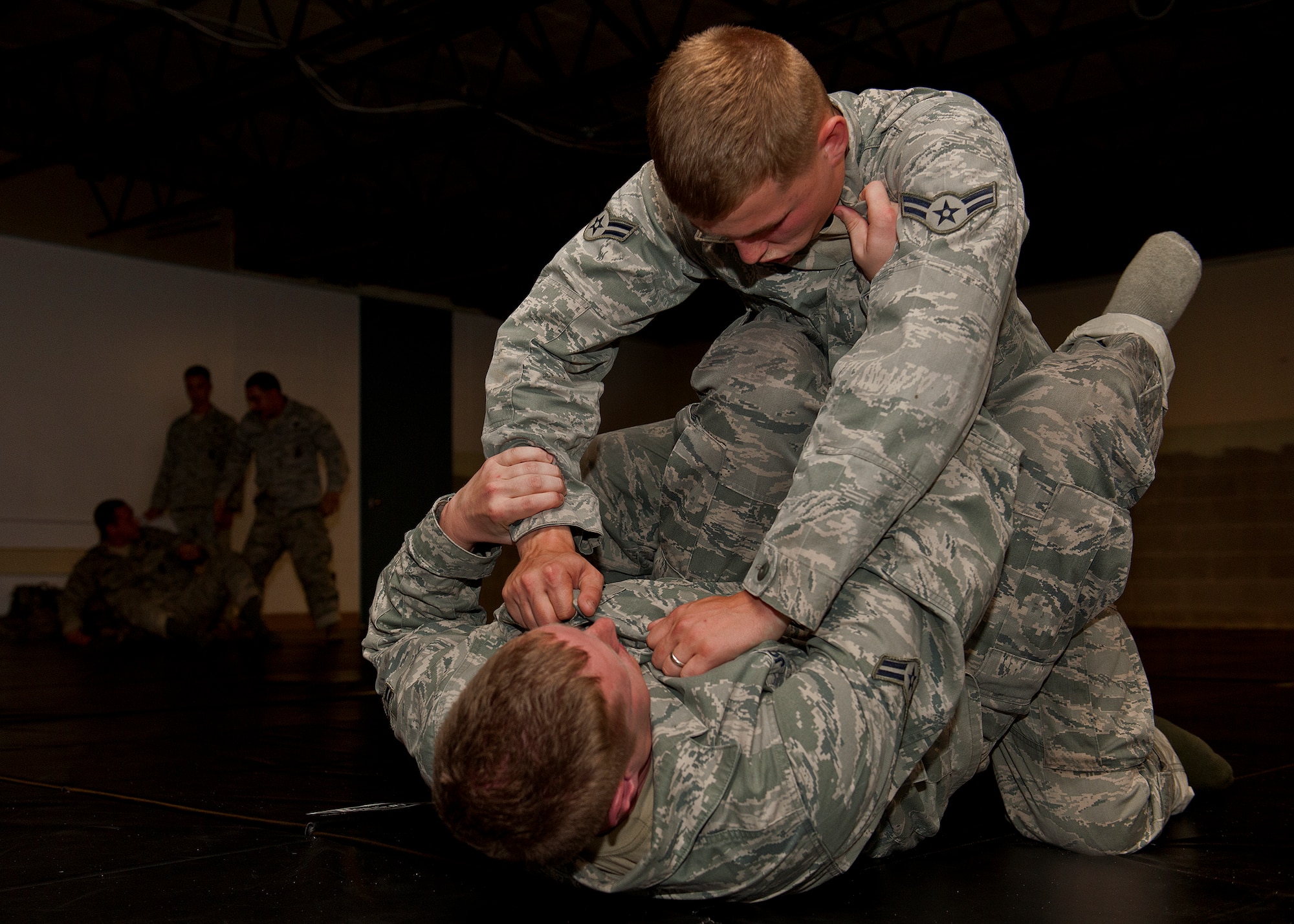 Security Forces Airmen practice combative techniques as part of their “Brave Defender” deployment training at Eglin Air Force Base, Fla., Sept. 17.  The training is administered by the 96th Ground Combat Training Squadron.  Although not part of the standard course, GCTS provided the specialized training to those Airmen who required it base on their deployed mission. More than 1,400 Airmen from across the Air Force attend the three-week courses each year. (U.S. Air Force photo/Samuel King Jr.)