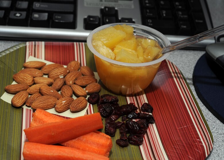 ALTUS AIR FORCE BASE, Okla. – Fruits and nuts are examples of healthy and nutritious snacks to satisfy morning and afternoon cravings. For questions about health and nutrition, contact the 97th Medical Group Nutrition Program manager at 481-5251 or visit the base Health and Wellness Center. (U.S. Air Force photo by Airman 1st Class Klynne Pearl Serrano / 97th Air Mobility Wing / Released)