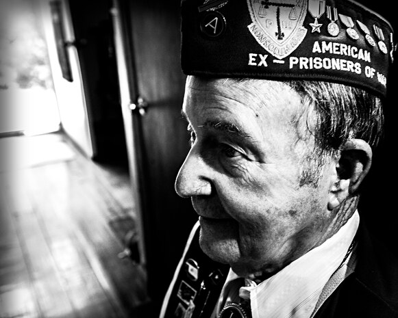 Reggie Salisbury, 87-year-old Army veteran, and member of the American Ex-Prisoners of War – Lowcountry Chapter, reflects on his military experience at his home, Sept. 14, 2012, in Ridgeville, S.C. Salisbury was a scout for a Native American Comanche code talker named Charlie Wall and is a veteran of the Invasion of Normandy and ex-POW. (U.S. Air Force Photo / Airman 1st Class Tom Brading)