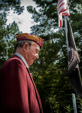 Reggie Salisbury, 87-year-old Army veteran, and member of the American Ex-Prisoners of War – Lowcountry Chapter, displays medals he received during World War II, including the Prisoner of War and World War II Victory Medals. Salisbury was a scout for a Native American Comanche code talker named Charlie Wall, and is a veteran of the Invasion of Normandy and ex-POW. (U.S. Air Force Photo / Airman 1st Class Tom Brading)