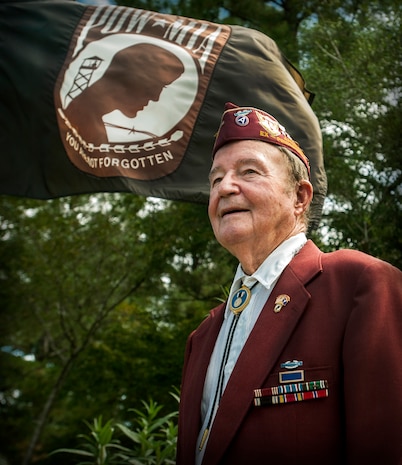 Reggie Salisbury, 87-year-old Army veteran, and member of the American Ex-Prisoners of War – Lowcountry Chapter, displays medals he received during World War II, including the Prisoner of War and World War II Victory Medals. Salisbury was a scout for a Native American Comanche Code Talker named Charlie Wall, and is a veteran of the Invasion of Normandy and ex-POW. (U.S. Air Force Photo / Airman 1st Class Tom Brading) 