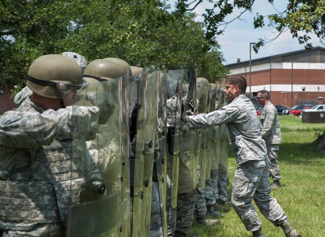 1st Lt. Thomas Cousino, 628th Security Forces Squadron, acts as a bystander during recent Riot Control Training at Joint Base Charleston - Air Base, S.C. The training focused on non-lethal crowd control and use of force procedures employed during various scenarios. (U.S. Air Force photo/ Airman 1st Class Ashlee Galloway)