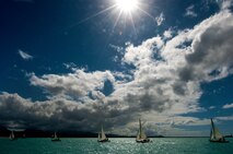 The Wet Hens, a sailing group founded by Louis “Papa Lou” Foster, a retired Air Force master sergeant, and creator of Hickam Harbor, sail around the harbor to spread the ashes of their late founder, Sept. 1 at Joint Base Pearl Harbor-Hickam, Hawaii. Founder of the Wets Hens, an all-female sailing club at Hickam, Foster is best known for his sailing skills. He died in his hometown of Eagle Point, Ore., at the age of 90. (U.S Air Force photo/Staff Sgt. Mike Meares)