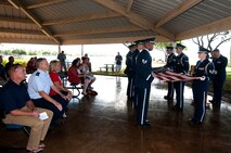 The Hickam Honor Guard folds a flag during the memorial ceremony for Louis “Papa Lou” Foster, a retired Air Force master sergeant, and creator of Hickam Harbor, at Foster Point, Sept. 1 at Joint Base Pearl Harbor-Hickam, Hawaii. Founder of the Wets Hens, an all-female sailing club at Hickam, Foster is best known for his sailing skills. He died in his hometown of Eagle Point, Ore., at the age of 90. (U.S Air Force photo/Staff Sgt. Mike Meares)