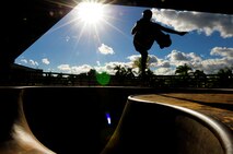 Chris Kays, son of the Hickam Skate Hangar’s proprietor Mike Kays, performs a trick at the Hickam Skate Hangar Aug. 21, Joint Base Pearl Harbor-Hickam, Hawaii. He is a professionally sponsored skateboarder who provides lessons for any level of skater at the hangar. The converted hangar is the only indoor wooden facility on all the Hawaiian Islands. It also boasts the only wooden keyhole bowls, or empty swimming pool shaped ramps, on Oahu. In addition, it has a 15,000 square foot street course, multiple mini ramps, 12-foot vertical ramp with a 14-foot tombstone connected to a saddle and three-quarter pipe. (U.S. Air Force photo/Staff Sgt. Mike Meares)