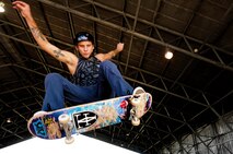 Chris Kays, son of the Hickam Skate Hangar’s proprietor Mike Kays, performs a trick at the Hickam Skate Hangar Aug. 21, Joint Base Pearl Harbor-Hickam, Hawaii. He is a professionally sponsored skateboarder who provides lessons for any level of skater at the hangar. The converted hangar is the only indoor wooden facility on all the Hawaiian Islands. It also boasts the only wooden keyhole bowls, or empty swimming pool shaped ramps, on Oahu. In addition, it has a 15,000 square foot street course, multiple mini ramps, 12-foot vertical ramp with a 14-foot tombstone connected to a saddle and three-quarter pipe. (U.S. Air Force photo/Staff Sgt. Mike Meares)