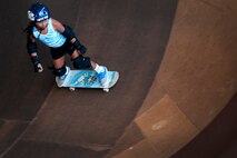 Kody Tamanaha, 8, of Mililani, Hawaii, skates inside one of the bowls at the Hickam Skate Hangar Aug. 16 at Joint Base Pearl Harbor-Hickam, Hawaii. The converted hangar is the only indoor wooden facility on all the Hawaiian Islands. It also boasts the only wooden keyhole bowls, or empty swimming pool shaped ramps, on Oahu. In addition, it has a 15,000 square foot street course, multiple mini ramps, 12-foot vertical ramp with a 14-foot tombstone connected to a saddle and three-quarter pipe. (U.S. Air Force photo/Staff Sgt. Mike Meares)