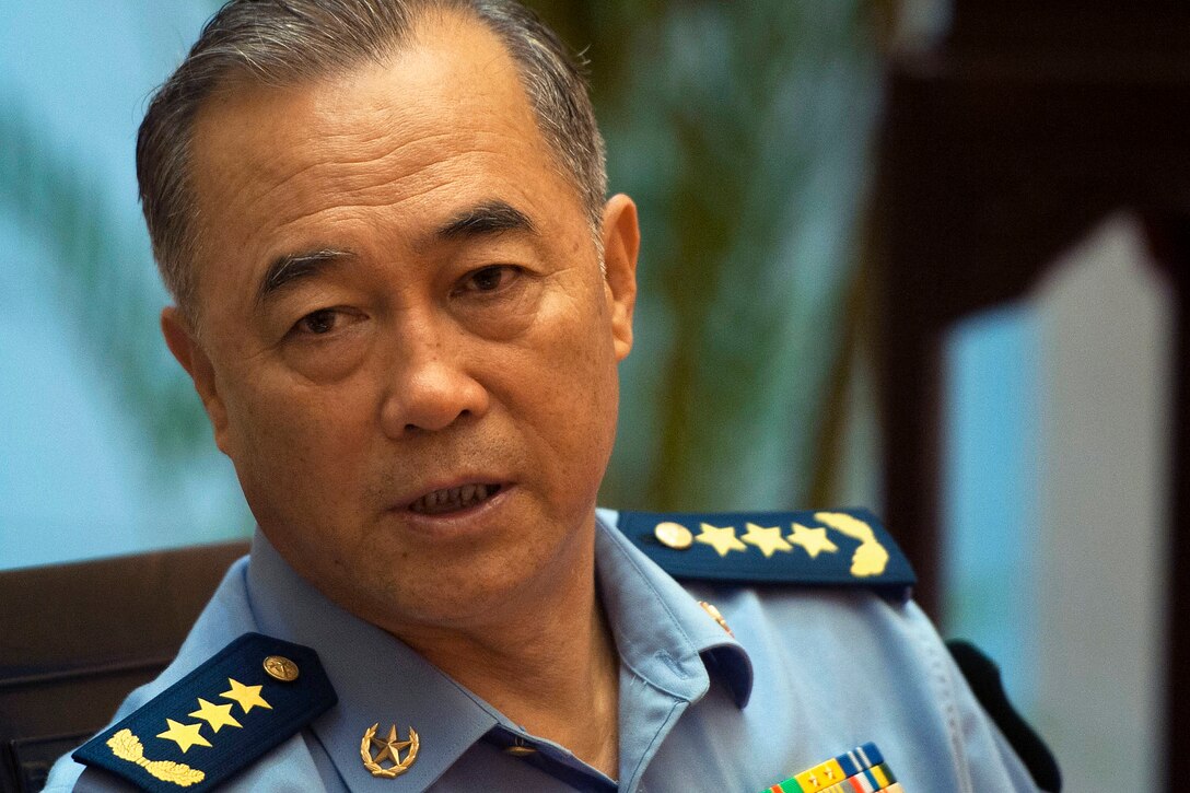 Chinese Air Force Gen. Ma Xiaotian, the Chinese army's deputy chief of general staff, speaks with U.S. Defense Secretary Leon E. Panetta during a departure meeting in Beijing, Sept. 20, 2012.