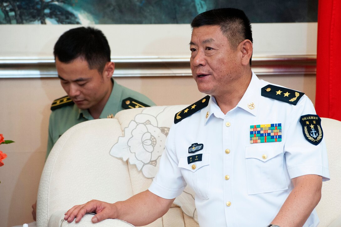 Chinese Vice Adm. Tian Zhong, commander of the People's Liberation Army's Navy North Sea Fleet, meets with U.S. Defense Secretary Leon E. Panetta in Qingdao, China, Sept. 20, 2012.