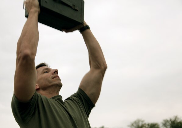 Lieutenant Colonel Mark W. Shellabarger, a joint logistics monitor attending the 2012 Marine Theater Conference, performs the ammunition-can lift portion of the Combat Fitness Test. The 5th Annual TMC brought Marines stationed throughout Europe and Africa to come to MFE and MFA headquarters in Stuttgart, Germany, Sept. 18-20, to conduct annual training, and medical and dental screenings not readily available at their outlying duty stations. Some attendees came as far away as Azerbaijan, Morocco, Kenya, Armenia and the United Kingdom. 

