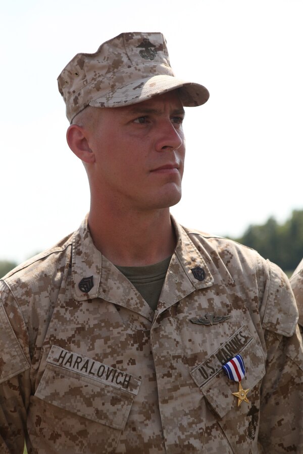 Staff Sgt. Alec Haralovich was presented the Silver Star Medal, the nation’s third highest award for combat heroism, for his actions during a combat deployment to Afghanistan in 2011. After Haralovich was shot twice in his body armor by an insurgent, he destroyed an enemy stronghold with a rocket and led his Marines on a two-hour assault after their ambushers during an Afghanistan deployment in 2011. Haralovich is a reconnaissance Marine assigned to E Company, 4th Reconnaissance Bn., 4th Marine Division.
